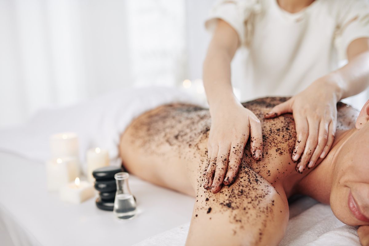 massaging-back-with-coffee-scrub-2021-08-28-02-47-03-utc.jpg