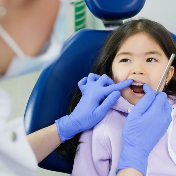 young child getting teeth checked