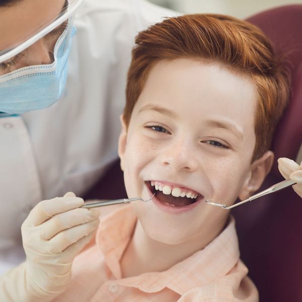 smiling child at the dentist