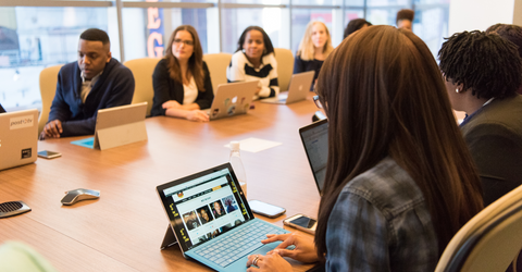 employees at conference table