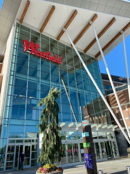 Exterior view of large retail mall redevelopment project by BKG Construction Group, including multi-million-square-foot renovations and new builds.