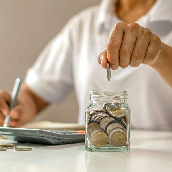 Person doing finances Are Dental Implants Right for You3.jpg