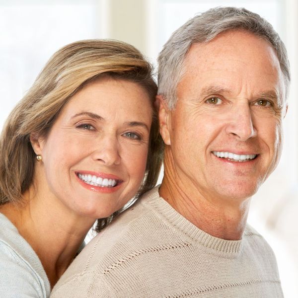 Older Couple Smiling The Benefits of Dental Implants Over Traditional Dentures4.jpg