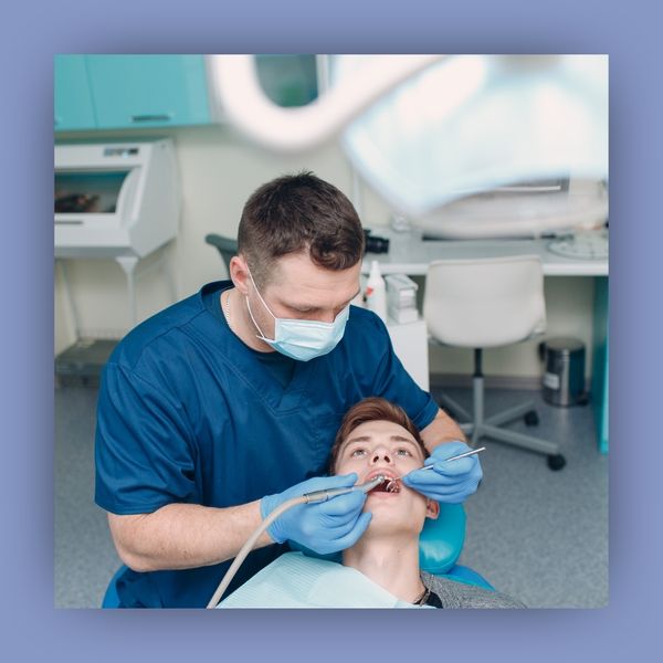 Dentist with a patient