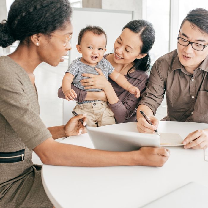 family looking over life insurance