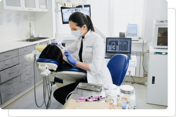 hygienist working on a patient