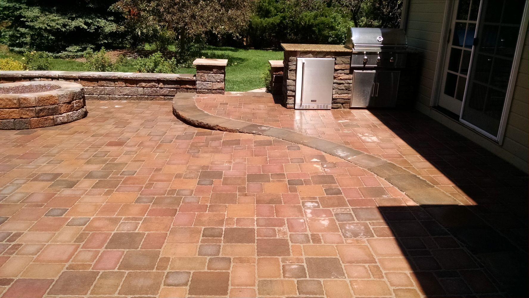 paver patio, fire pit, outdoor kitchen.jpg
