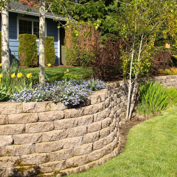 landscaping with brick retaining wall