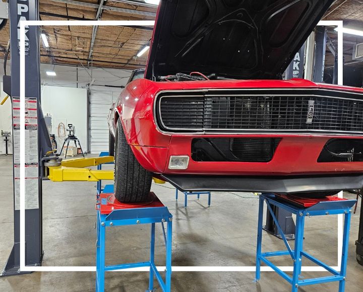 Red '69 Mustang Mach 1 Cobra Jet on Blocks