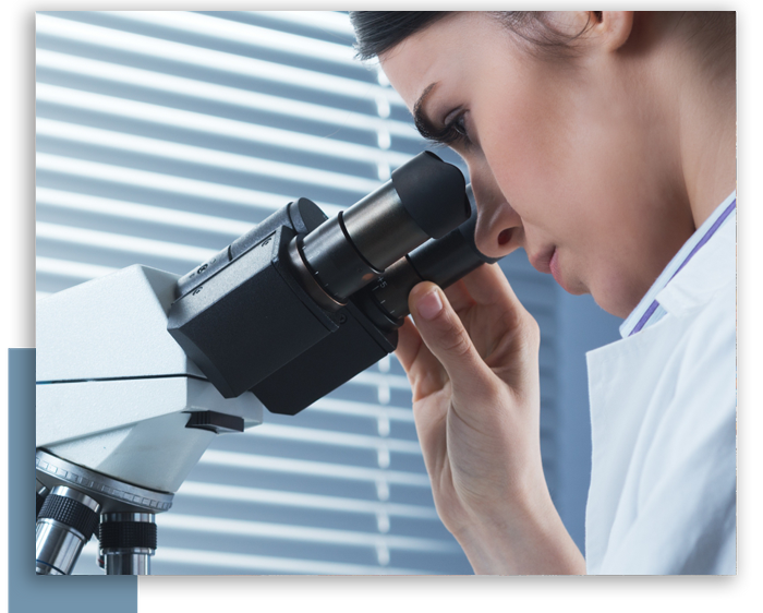 Scientist Looking Through a microscope