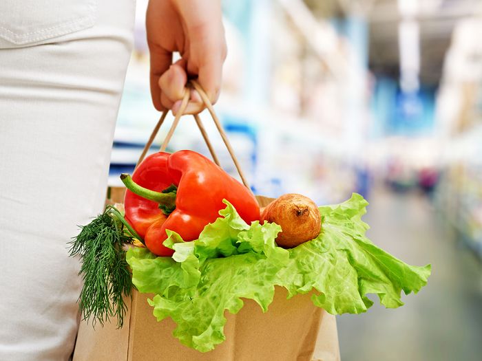 Image of a woman with grocery bags