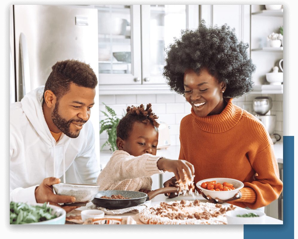 family making pizza