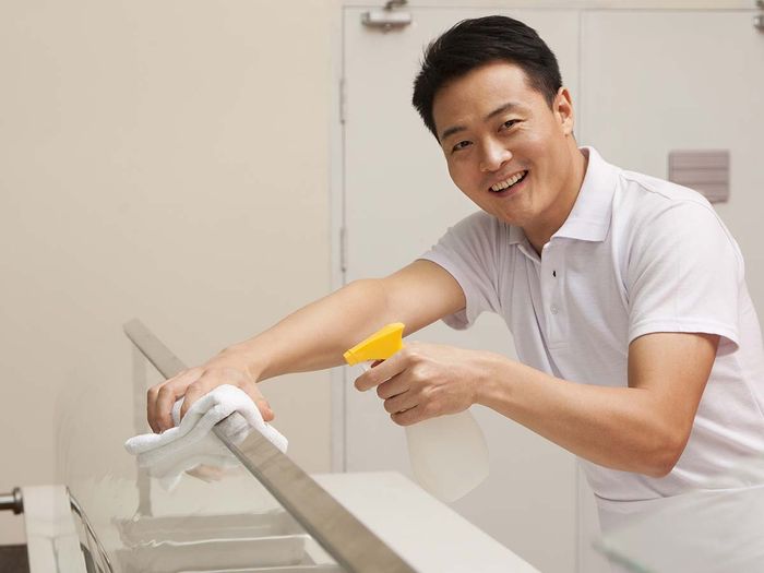 man cleaning laboratory space