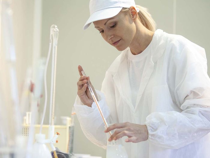 woman doing various tests on cheese