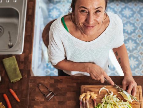 woman cutting vegetables 