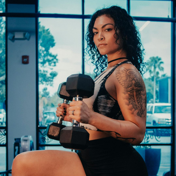Woman lifting dumbells