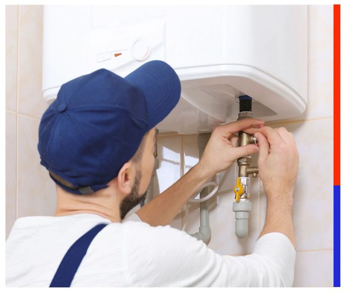a professional fixing a water heater