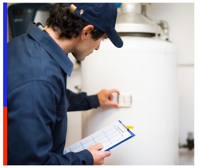 a professional with a clipboard inspecting a water heater