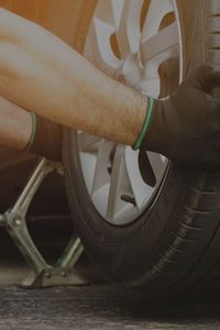 replacing tire on car
