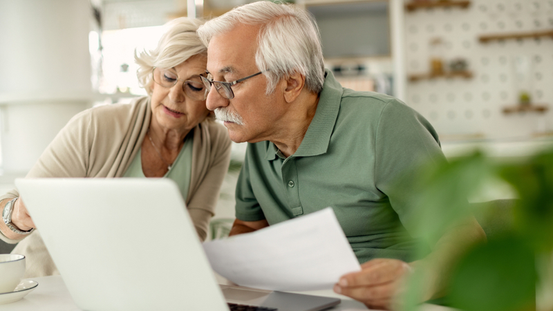 image of retirees looking at investments