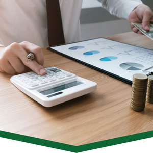 using calculator, counting stacks of coins/cash