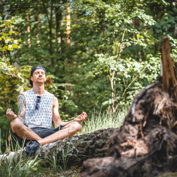man meditating in nature man meditating in nature