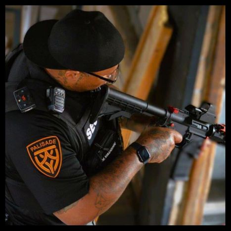 Security guard holding a gun Armed Security - Las Vegas List 1.jpg