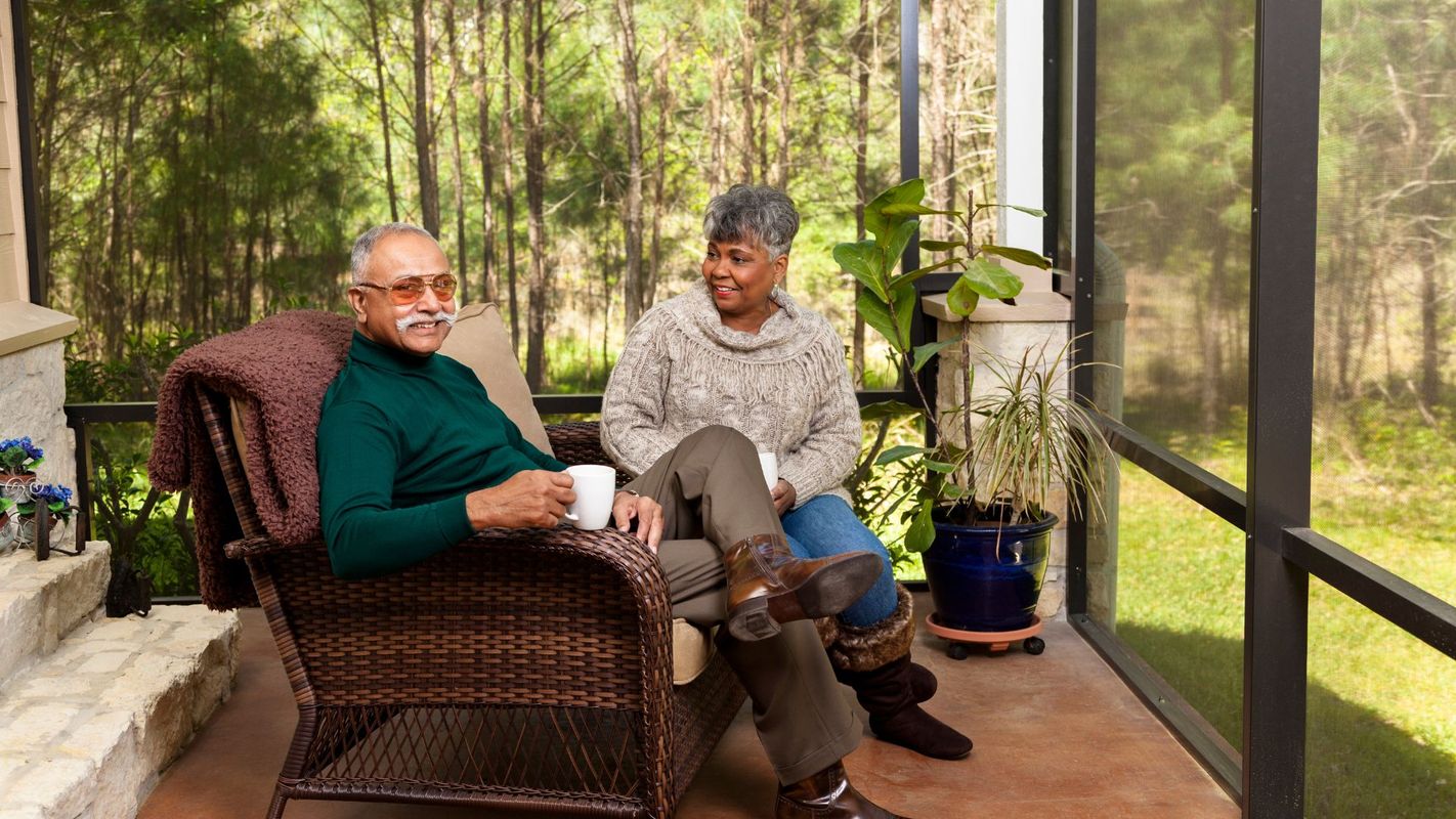 couple enjoying a screened-in porch