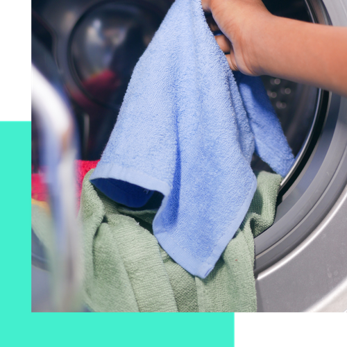 towels being put into dryer