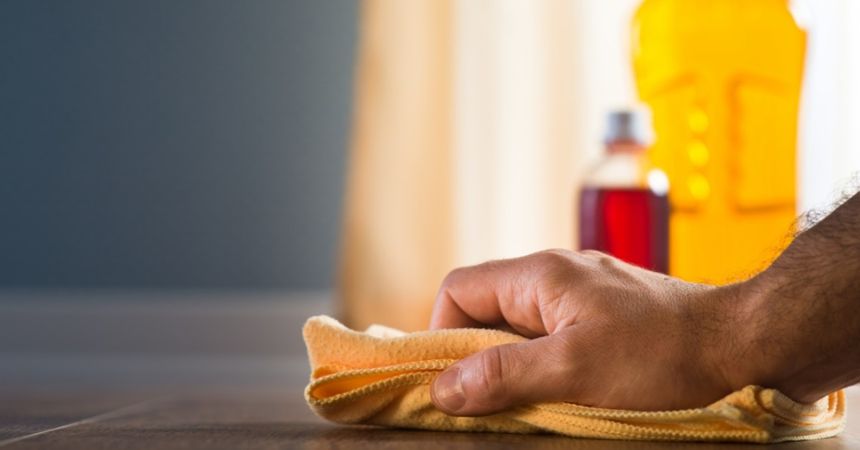 wiping down countertop
