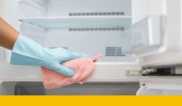 cleaning inside of refrigerator