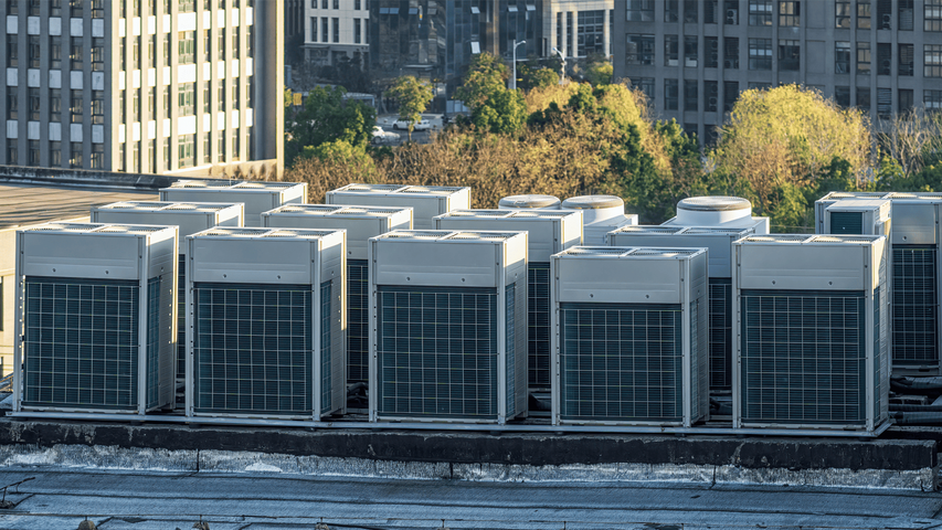 Commercial rooftop HVAC units (RTUs) on a commercial building