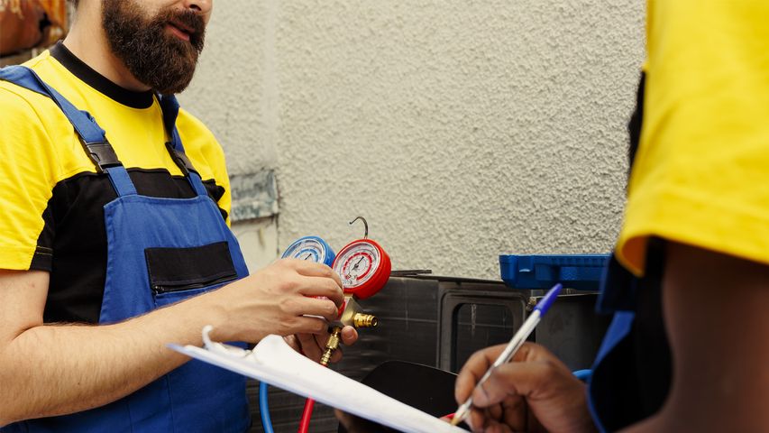 Experienced HVAC mechanical contractors performing AC mechanical diagnostics and maintenance. Skilled technicians ensuring reliable mechanical air conditioning performance. Professional HVAC Mechanical Contractors at Work