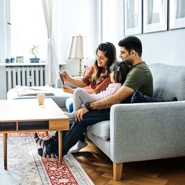 happy family in bright airy living room