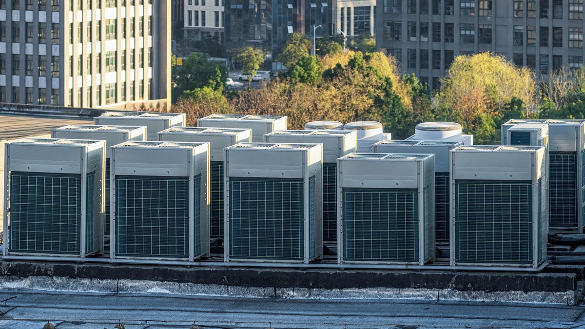 Rooftop of a commercial building with a group of VRF/VRV outdoor units serving multiple indoor zones