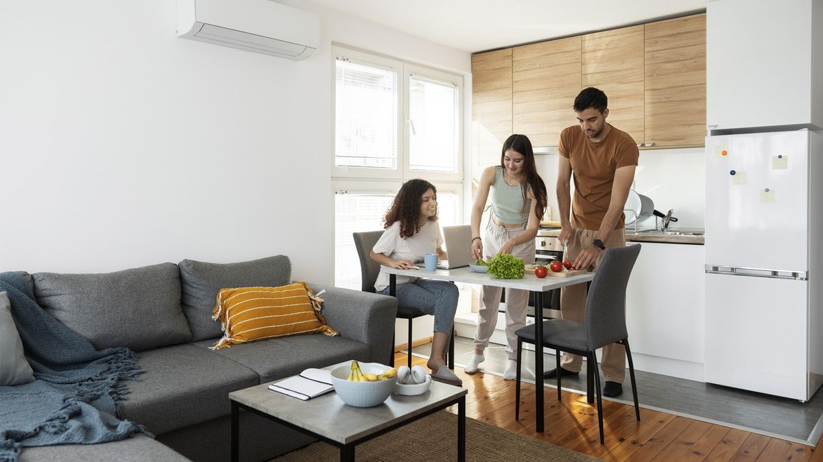 Wall-mounted mini-split providing whole-room cooling