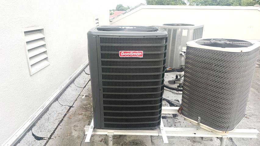 Professional air conditioner installation with new Goodman AC unit