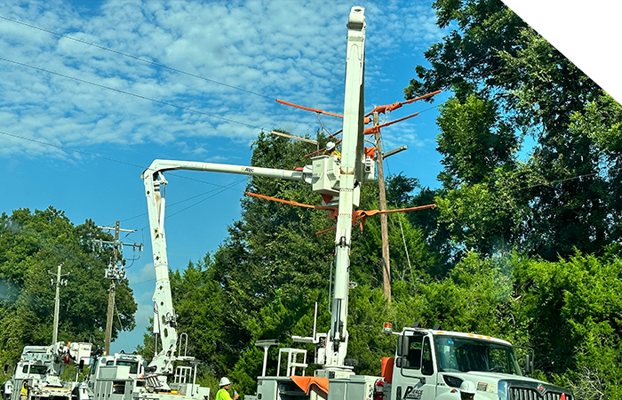 Powerline trucks near powerline