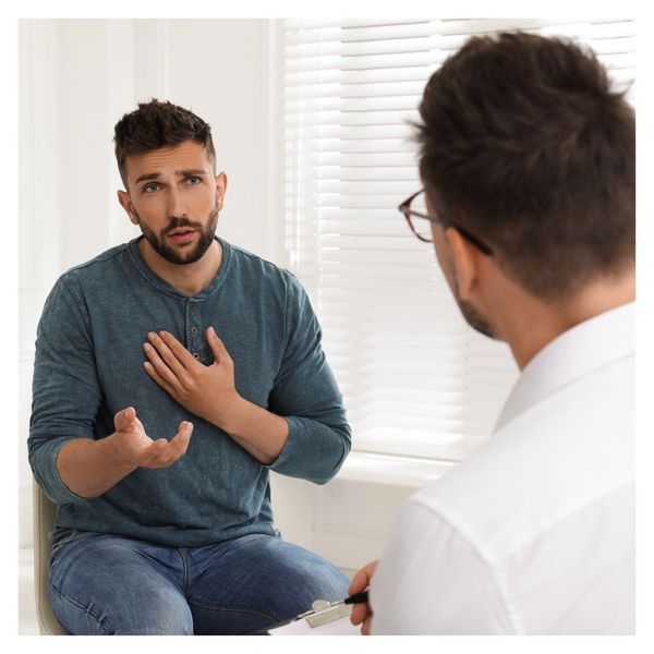 man consulting with doctor