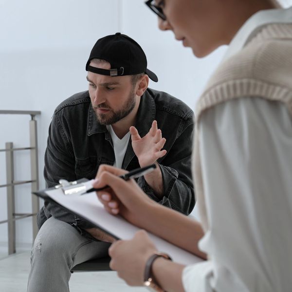 man going over history with doctor 