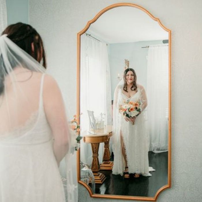 bride looking in the mirror bride looking in the mirror