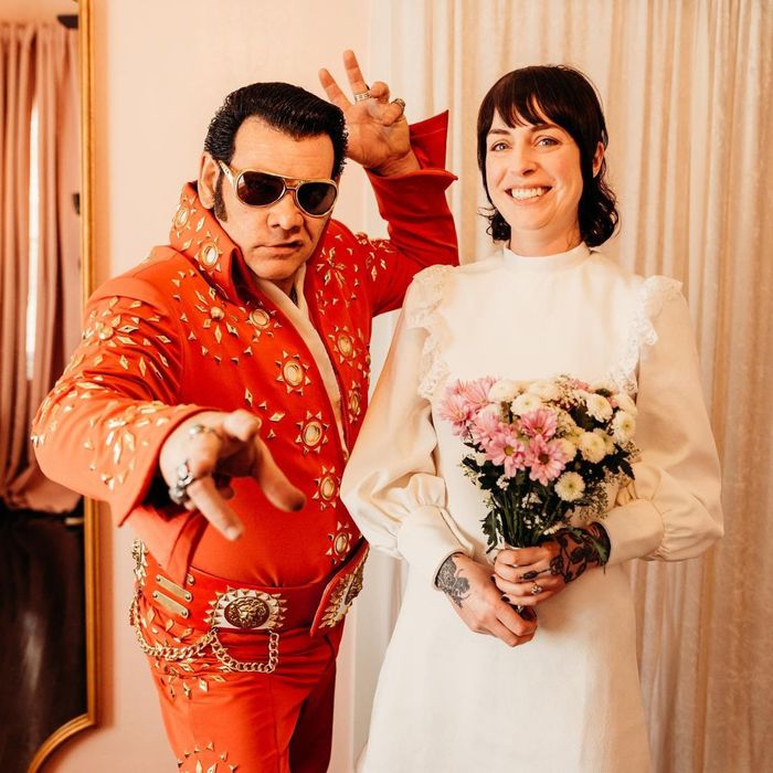 bride with Elvis impersonator officiant