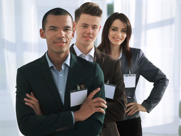business associates with name tags business associates with name tags