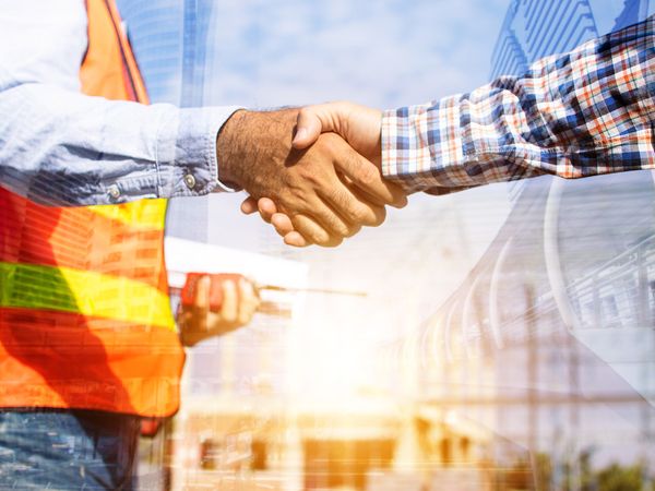 photo of 2 contractors shaking hands