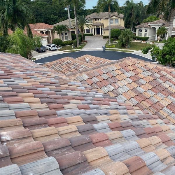 clay roof being inspected, view from above