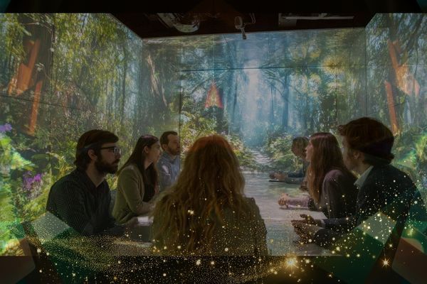 People sit at a table surrounded by nature conservation scene