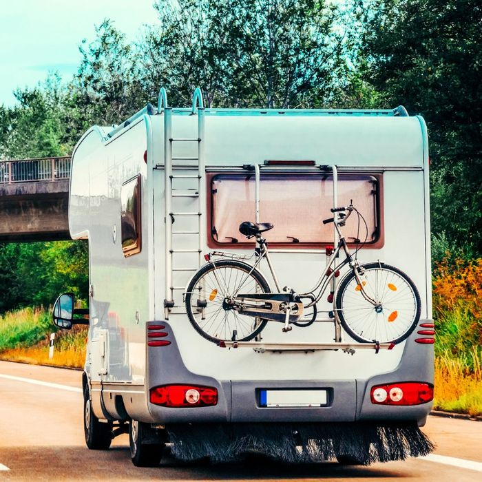 camper driving on highway