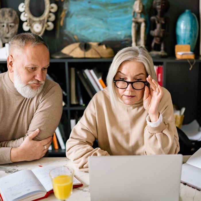 Coupel looking at their laptop