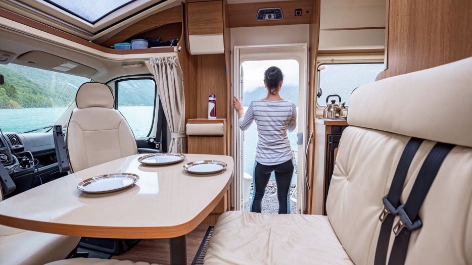 woman standing in doorway of motorhome
