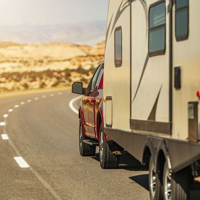 Truck and camper on the open road